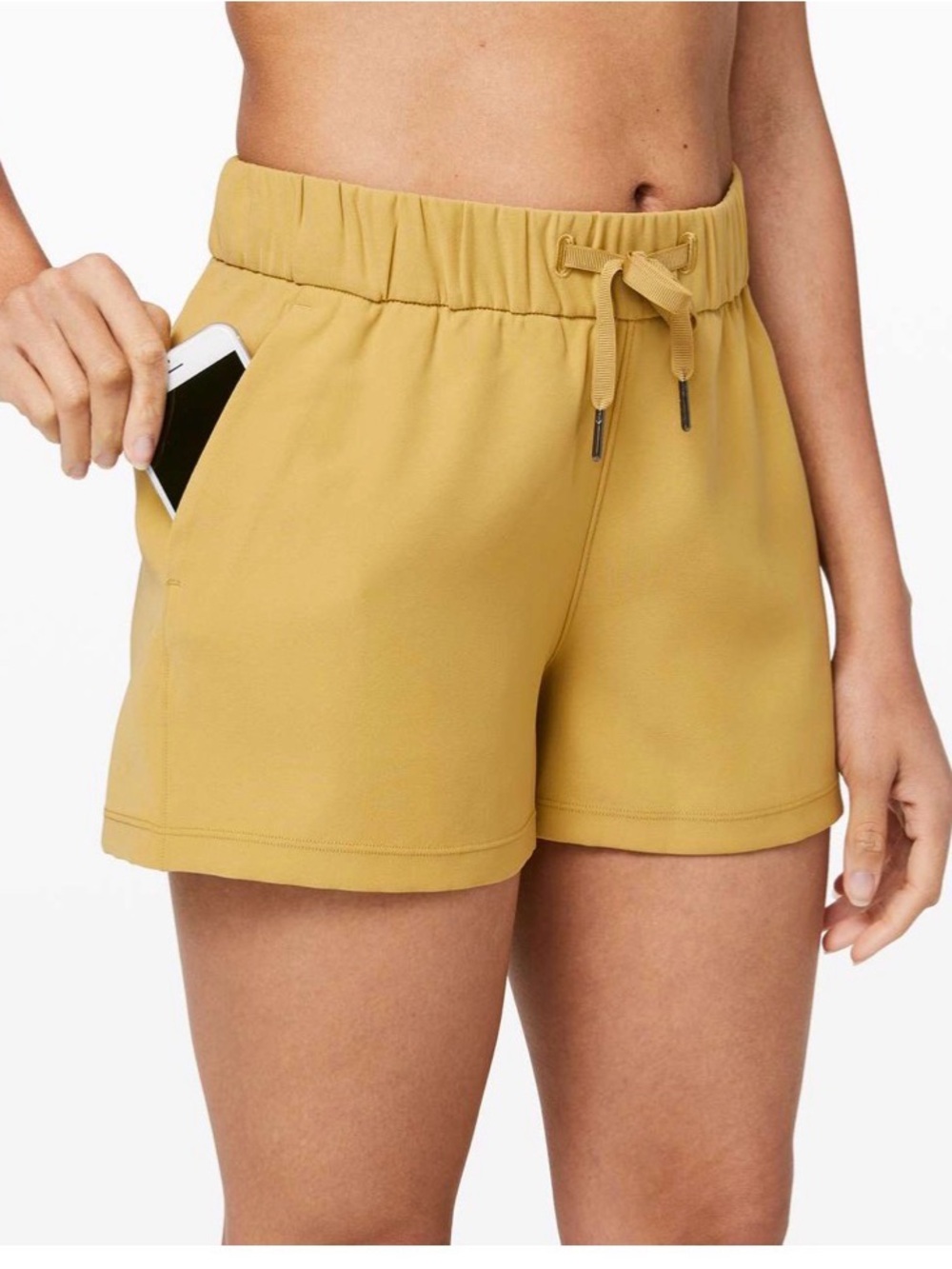 Lululemon On the Fly Short mustard yellow drawstring shorts